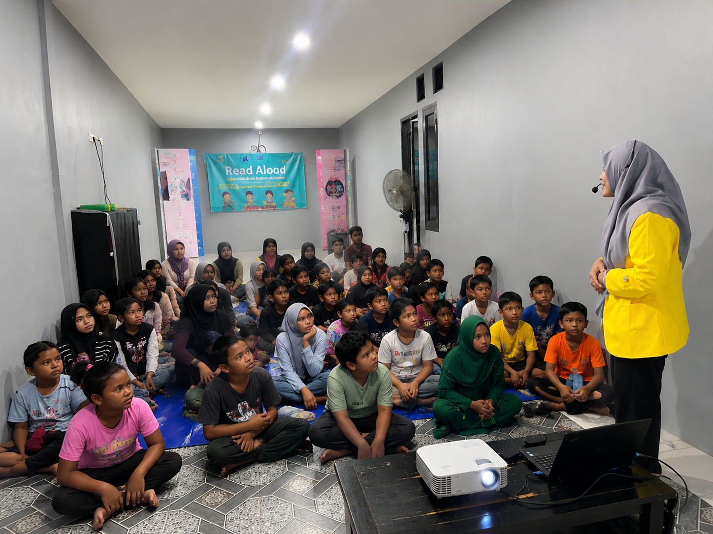Rizqa Aulia Rahmah: Kuliah Literasi Anak Melalui Metode Read-Aloud, Game Interaktif serta Lagu Edukatif untuk Tingkatkan Minat Baca
